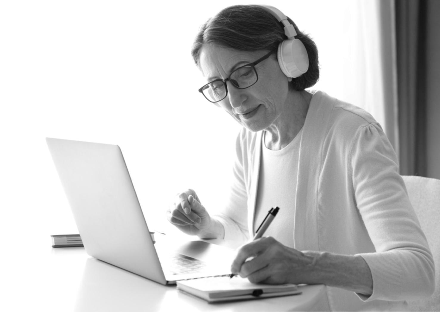 Person working on financial planning at a clean desk setup